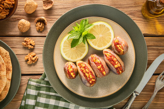 Arabic Cuisine; Makdous is a traditional Lebanese preserve made from baby eggplants stuffed with walnuts, red peppers, chili and garlic.