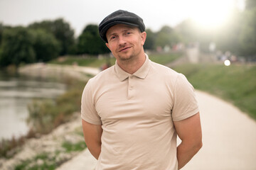 Obraz premium Portrait of smiling handsome middle aged man farmer