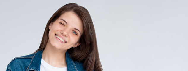 Portrait of attractive flirty cheerful girl winking good mood isolated over white background