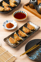 Grilled Gyoza or jiaozi fried stuffed dumplings