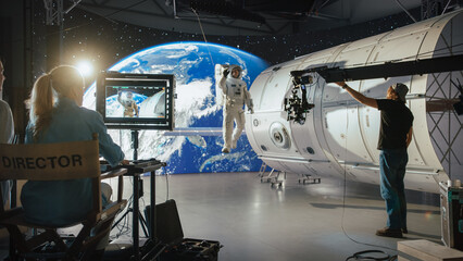 Innovative Female Director Leads a Diverse Crew in Filming a Sci-fi Movie Using Virtual Production and CGI, Featuring an Astronaut on a Futuristic Set With Advanced Equipment and Immersive Visuals.
