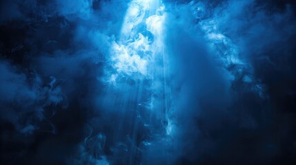 Fototapeta premium A strong beam of blue light cutting through thick smoke, illuminating a dark scene with a dramatic and captivating effect.