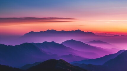 A colorful sunrise over a mountain range.