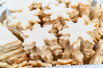 Baking Snowflake-Shaped Sugar Cookies for Homemade Christmas Gifts