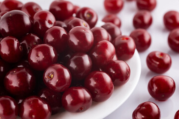 Ripe ripe cherries isolated on white background.