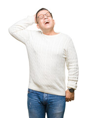 Middle age arab man wearing glasses over isolated background Smiling confident touching hair with hand up gesture, posing attractive