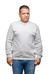 Fototapeta premium Middle age arab man wearing sport sweatshirt over isolated background depressed and worry for distress, crying angry and afraid. Sad expression.