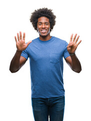 Afro american man over isolated background showing and pointing up with fingers number nine while...