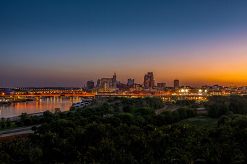 Fototapeta premium Saint Paul Minnesota Skyline at Sunset taken from Indian Mounds Regional Park Overlook with the Mississippi River passing downtown