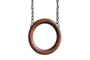 A rusty metal circle with a chain hanging from it