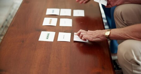 Mental health, therapy and people with memory game for senior care, dementia or mind assessment. Healthcare, elderly person and caregiver for card test, puzzle or alzheimer evaluation in nursing home - Powered by Adobe