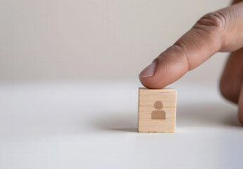 Inbound marketing strategy concept. customer retention, digital marketing, and creating attraction for customer groups in business. Hand-held wooden block with magnet icon attracts the customer icon