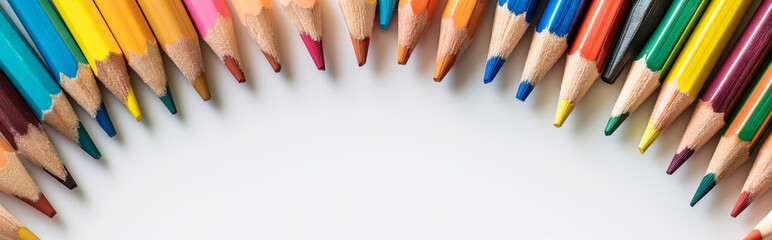 Fototapeta premium background made of colorful wooden pencils on white background, back to school banner concept