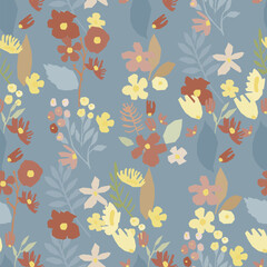 Naklejka premium A seamless floral pattern featuring pastel blooms and leaves on a blue background, perfect for print, fabric, wrapping and paper