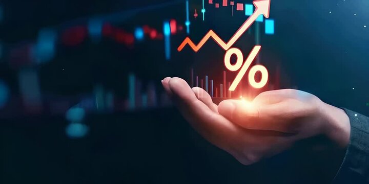 A hand holding glowing percent icon with an arrow upward on dark background symbolizing financial growth and success