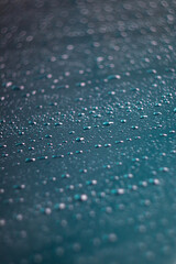 Raindrops on the window glass, water drops on the glass surface, raindrops on the window