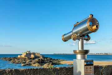 Binocular public viewer and  the castle of St Malo in Saint Malo, llle-et-Vilaine, Brittany, France