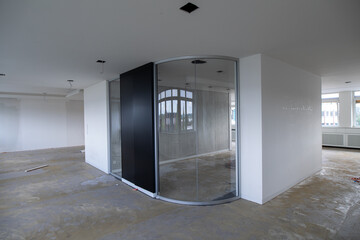 Office Interior Under Construction with Glass Wall