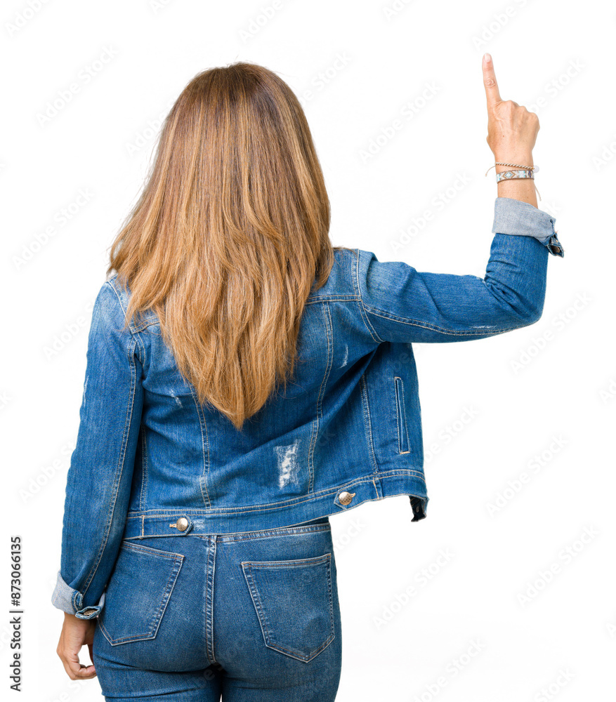 Poster Beautiful middle age woman wearing casual denim jacket over isolated background Posing backwards pointing behind with finger hand