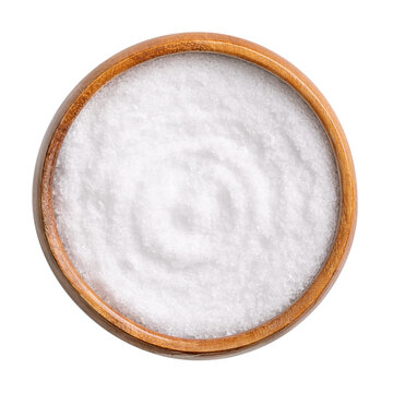 Birch sugar, table sweetener based on xylitol, in a wooden bowl, from above. Also called xylite, a sugar substitute of natural origin with 40 percent fewer calories.