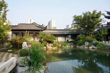 Fototapeta premium The garden in the luxury villa area of the Chinese city, the garden-style scenery of Jiangnan in China.