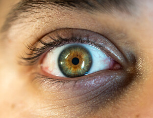Close up view of a male eye.