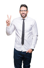 Young handsome business man wearing glasses over isolated background showing and pointing up with fingers number two while smiling confident and happy.