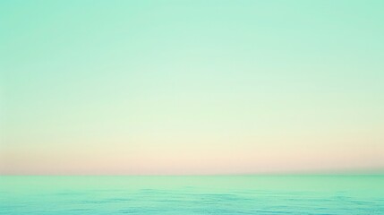 Obraz premium A gradient pastel with hues of periwinkle blending into a light seafoam green, offering a dreamy and whimsical visual experience.