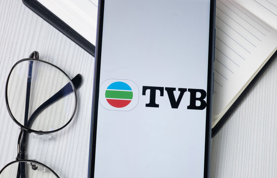 New York, USA - 30 June 2024: Television Broadcasts Logo on Phone Screen, TVB Company Icon