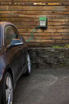 Vehicle getting charged at electric charging station