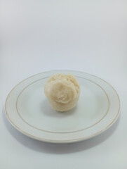 Kue Apem: Indonesian Steamed Sweet Dessert with White Brown Sugar or White Sugar, Showcasing Traditional Culinary Heritage on a Clean White Background
