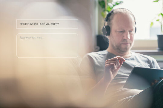 Mature man taking assistance of AI at home