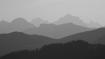 Naklejka premium Dream like mountain ranges in the morning light seen from Vorder Walig, Switzerland.