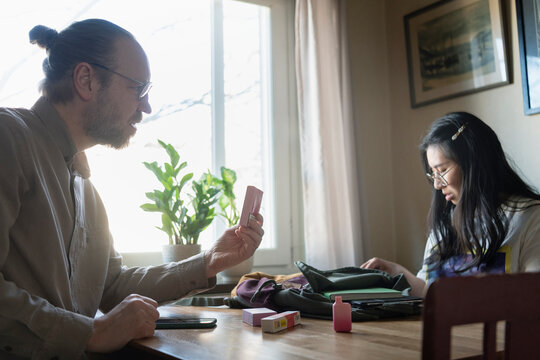 Father confronting daughter about vape pens