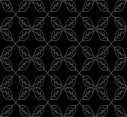 Seamless texture in the form of a pattern of white leaves on a black background