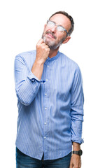 Fototapeta premium Middle age hoary senior man wearing glasses over isolated background with hand on chin thinking about question, pensive expression. Smiling with thoughtful face. Doubt concept.