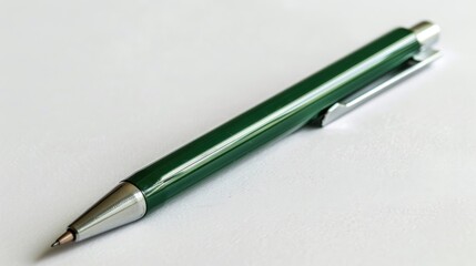 Green pen on white surface