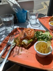 Top view delicious leaf with fresh vegetables and seasonings on a salmon and vegetables on bread meal dish leaf meat lunch and tea food