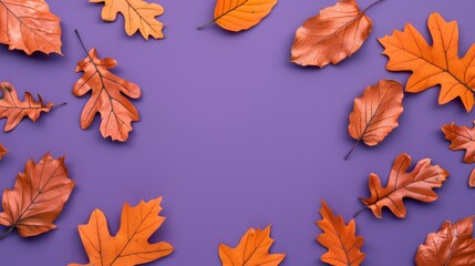 Fototapeta premium Pattern of dry orange metallic leaves on violet background, focus cover all object, deep dept of field