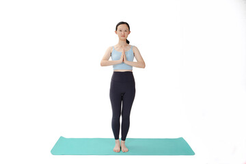 Obraz premium Beauty doing yoga with a white background