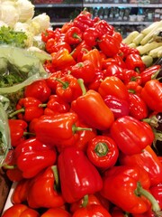 Red bell peppers on the counter in the supermarket,fresh vegetables.