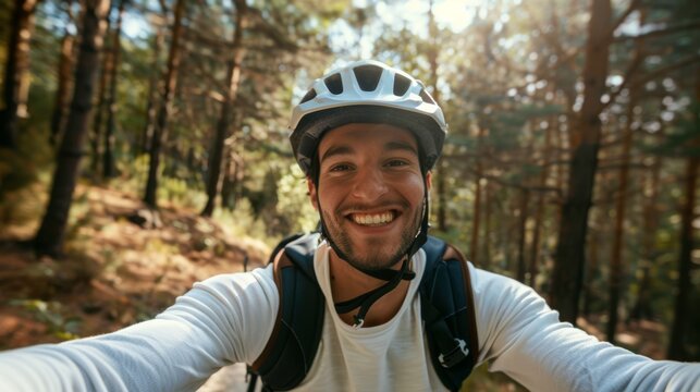 Selfie with man, bike, and forest, wellness with nature or grin, training or adventure blog. Bicycle, mountain bike, and influencer dude for social media profile, memory, or live broadcast.
