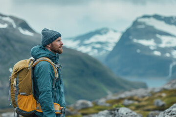 Solo climber man hiking reaching top of the mountain, Everest mountain snow covered.