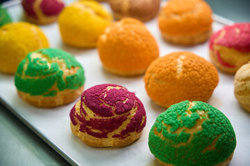 View to crispy colorful pastry choux au craquelin cookies