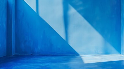 A simple blue background with subtle shades of light and shade