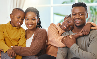 Fototapeta premium Portrait, black family and children on sofa with parents for relax, support or bonding together on weekend. Love, young kids and happy man with woman in living room for smile, hug or trust in home