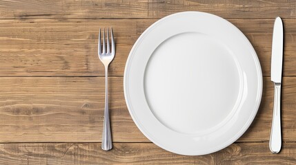 Empty plate set with spoon, fork, and knife, top view on a wooden surface, isolated studio lighting, perfect clarity, high quality for advertising