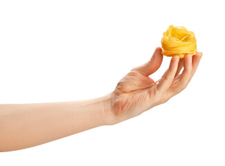 pasta tagliatelle in hand path isolated on white