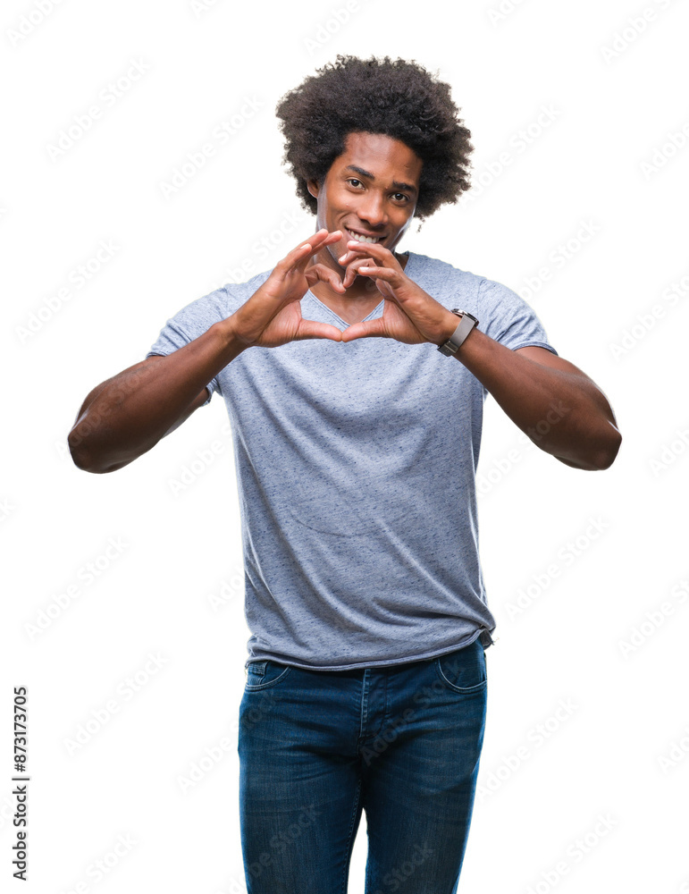 Wall mural Afro american man over isolated background smiling in love showing heart symbol and shape with hands. Romantic concept.