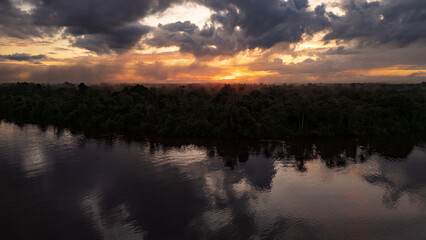 aerial images of sunrise in the Nanay River, within the Peruvian Amazon, Nanay River, water source for the city of Iquitos, black water rivers or Igapos in the interior of the Peruvian Amazon to visit